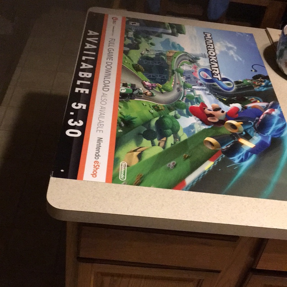 Nintendo promotional poster for Mario Kart 8 and Nintendo E Shop game release